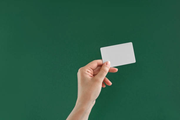 Female Hand Holding White Credit Card